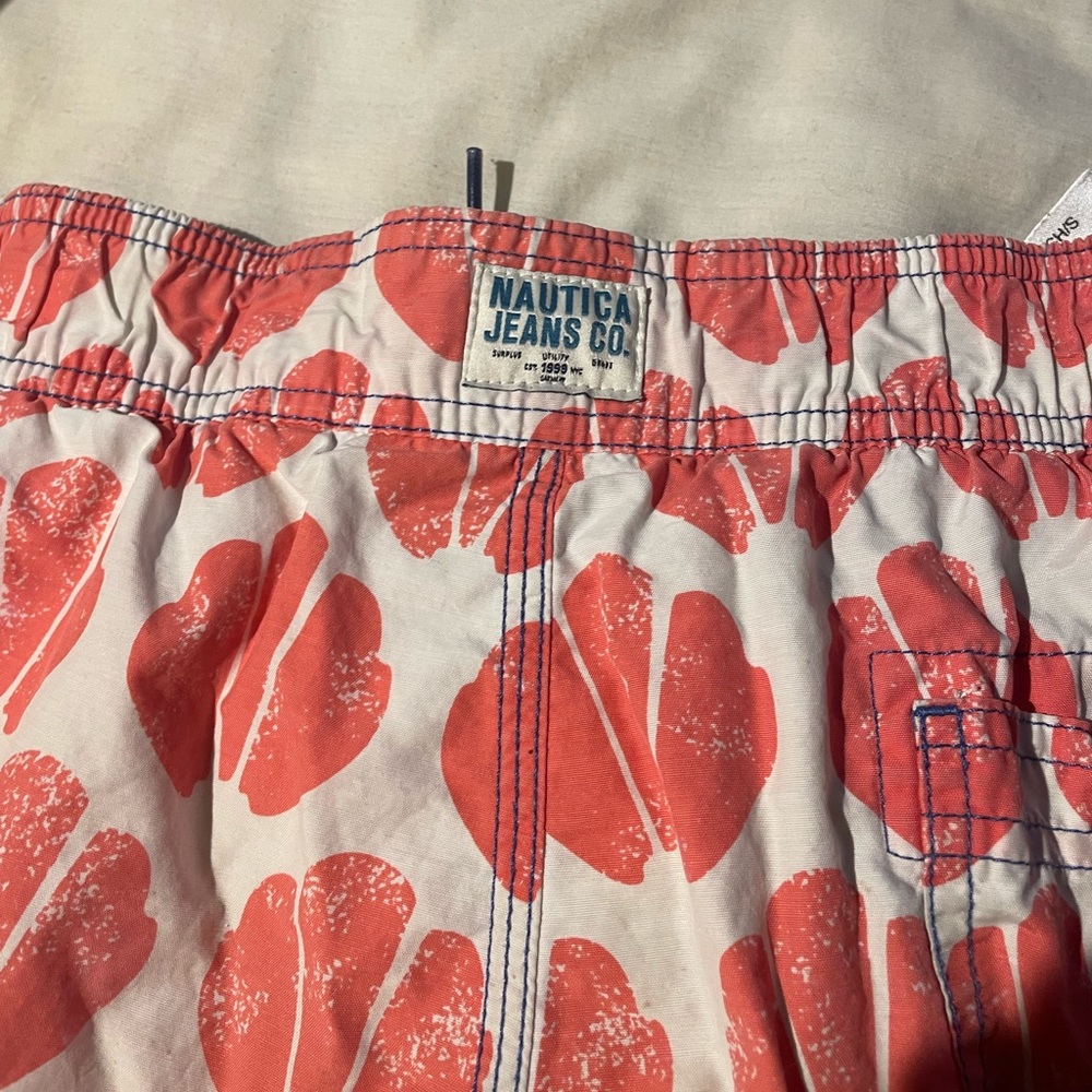 Fresh for the season! Trendy swim trunks! Orange, white and blue. Size small - Picture 2 of 4